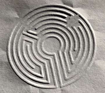 Labyrinth embosser stamp